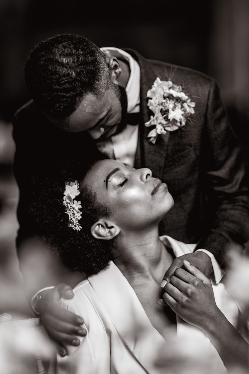 2D2A7806Beautifullightukphotography Emotive black and white wedding portrait of a newly married couple sharing a quiet, intimate moment together, captured naturally by a UK wedding photographer.