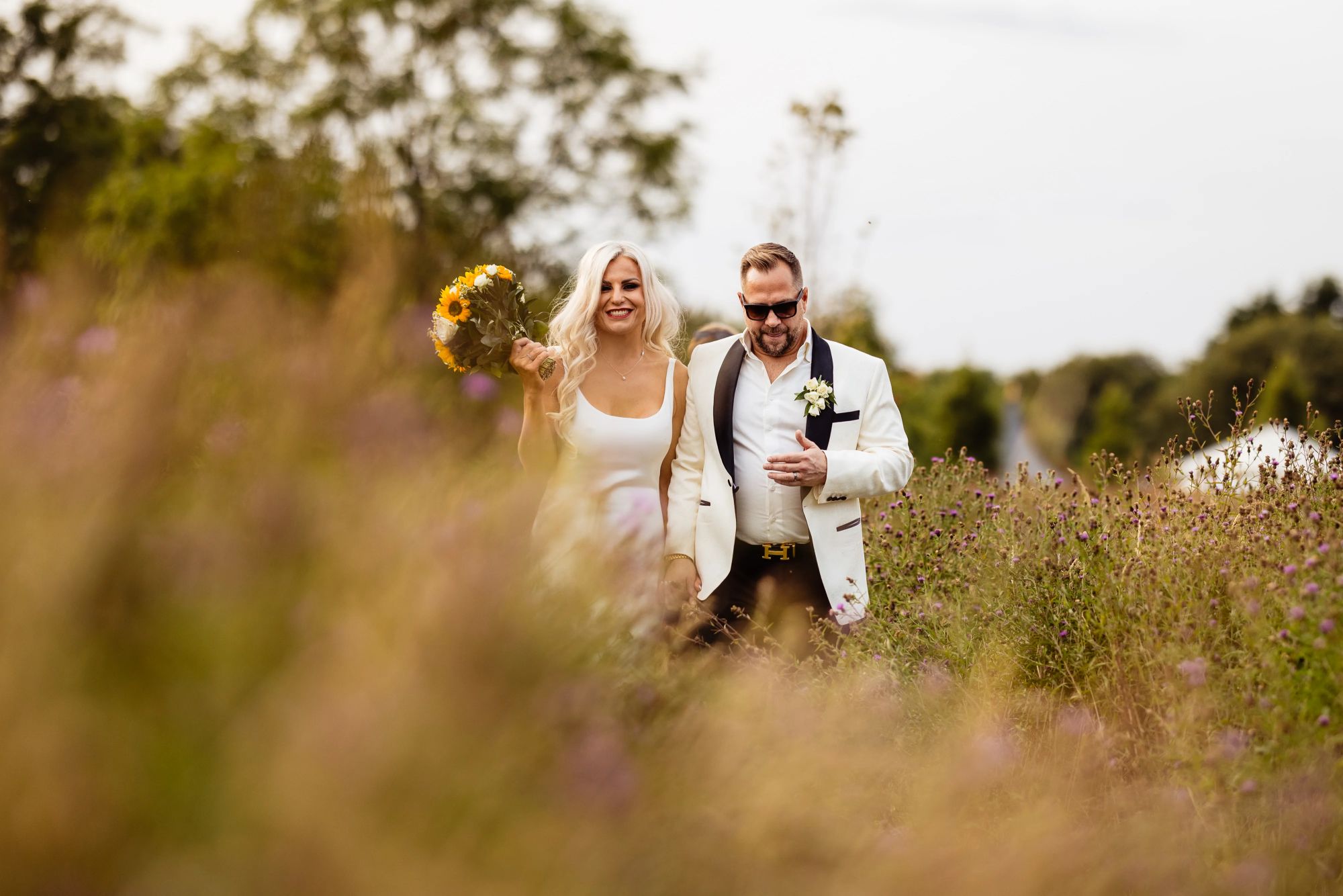 Relaxed couple portraits with Chiltern Hills views at Rackleys