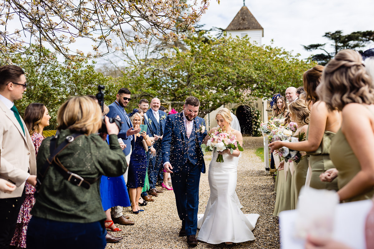 Beautifullightukphotography-0372240418 Emma J Smith Wasing Park wedding photographer photographing a confetti walk outside of St Nicholas church, Wasing park